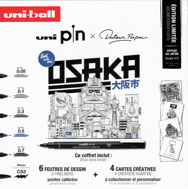can van de voorkant van de Uni-ball Pin x Docteur Paper Osaka creatieve box. Witte verpakking met strakke zwarte letters '
